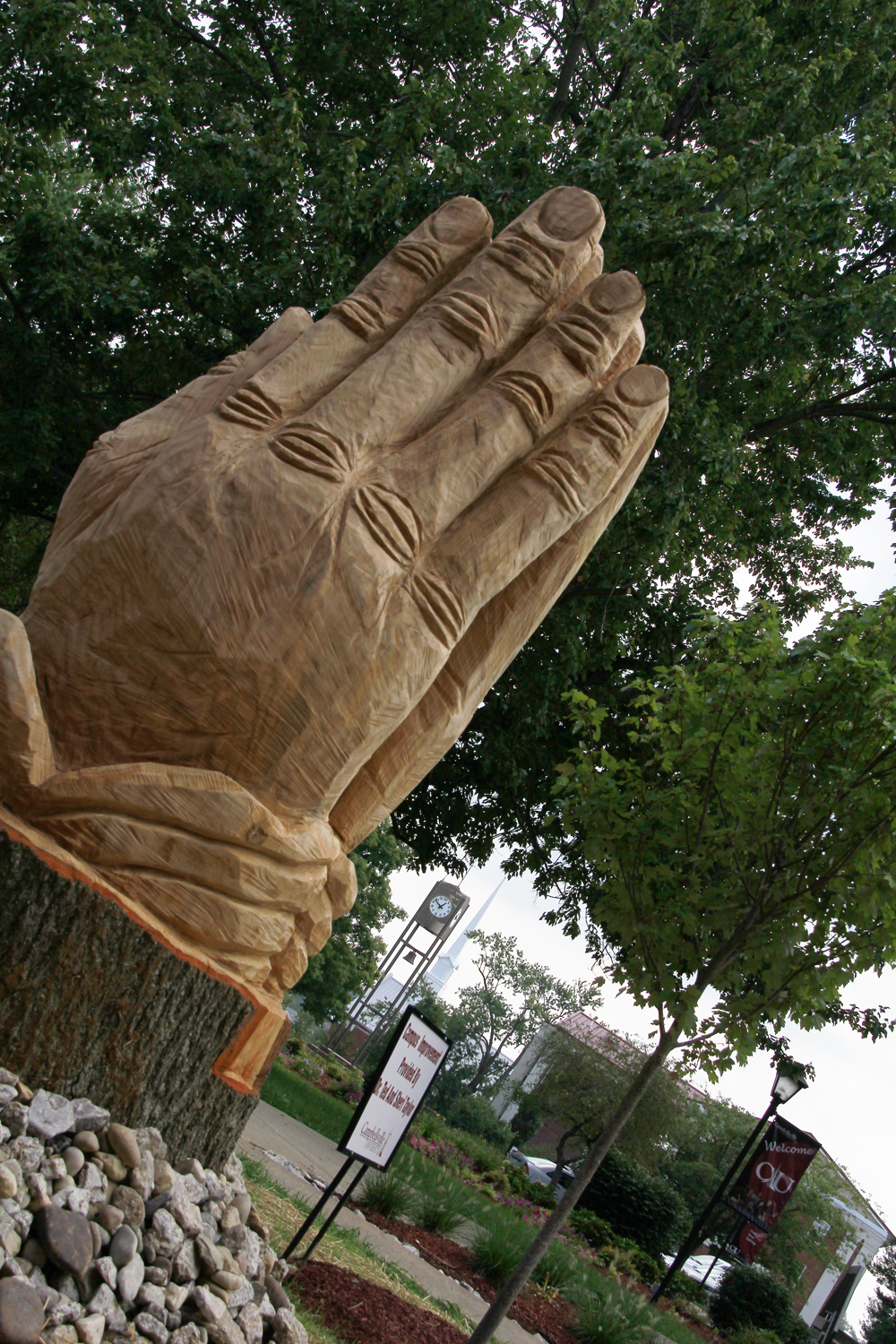 The praying hands was carved by Rob Peterson.  (Campbellsville University Photo by Rachel DeCoursey)