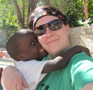  Erin Martin, a Dec. 2011 graduate of  CU's School of Nursing program from  Campbellsville, holds Mackenzie, a  Haitian boy she and her husband hope  to adopt. (Photo submitted)