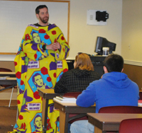 Max Wise, assistant professor of political science, taught class in his daughter's Wizard of Oz Snuggie last week as a result of a promise to his students. Wise, son of former Lady Tiger basketball coach Donna Wise, said if the men’s and women’s basketball teams were to sweep Georgetown College in the weekend basketball games, he would wear a Snuggie onto campus the following week. “Since we had already beaten them in football this season, I thought it would be a cool gesture to have them see one of their profs in class wearing a Snuggie,” Wise said. The teams defeated Georgetown, and Wise followed through with his promise. (Campbellsville University Photo by Bayarmagnai “Max” Nergui)