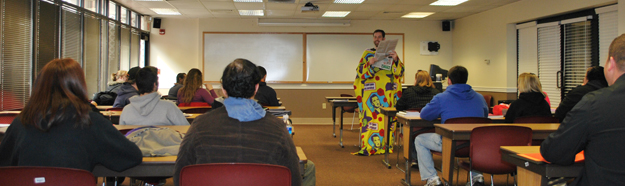 Max Wise, assistant professor of political science, taught class in his daughter's Wizard of Oz Snuggie last week as a result of a promise to his students. Wise, son of former Lady Tiger basketball coach Donna Wise, said if the men’s and women’s basketball teams were to sweep Georgetown College in the weekend basketball games, he would wear a Snuggie onto campus the following week. “Since we had already beaten them in football this season, I thought it would be a cool gesture to have them see one of their profs in class wearing a Snuggie,” Wise said. The teams defeated Georgetown, and Wise followed through with his promise. (Campbellsville University Photo by Bayarmagnai “Max” Nergui)