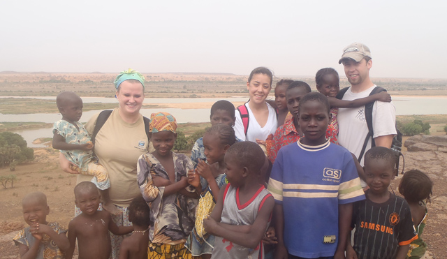  From left, Megan Parson, Alexa Moore and Trent Creason spend time with the children in the village of Boubon in Niger, Africa. (Photo submitted)