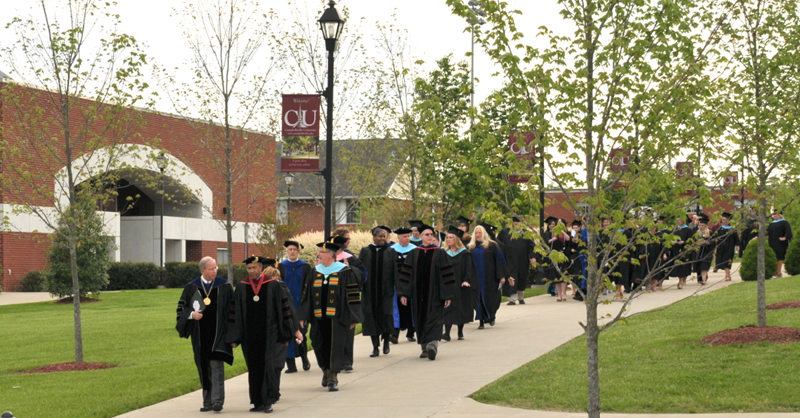 Master's graduates march into Ransdell Chapel as they continue the annual Senior Walk. (Campbellsville University Photo by Linda Waggener)