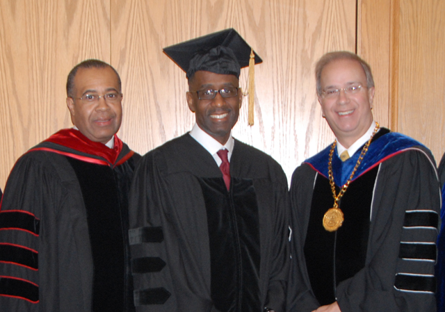Dr. Joe Owens, vice chair for CU's Board of Trustees, Dr. Kevin Cosby, president of Simmons College of Kentucky and undergraduate commencement speaker, and Dr. Michael V. Carter, president of CU, wait for the commencement ceremony to begin. (Campbellsville University Photo by Christina Miller)
