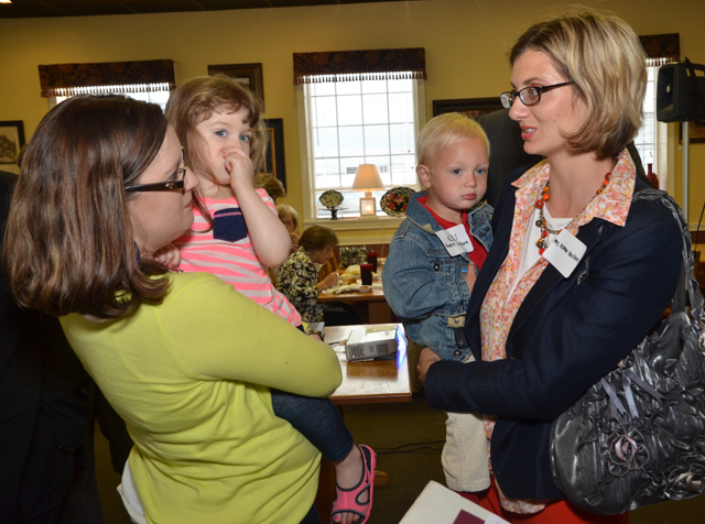 Jessica Whitaker Page (’05) and Alleena Koss Van Horn (’04) talk with their children, Carlee Page, and Emmit Van Horn at the event. (Campbellsville University Photo by Joan C. McKinney)  