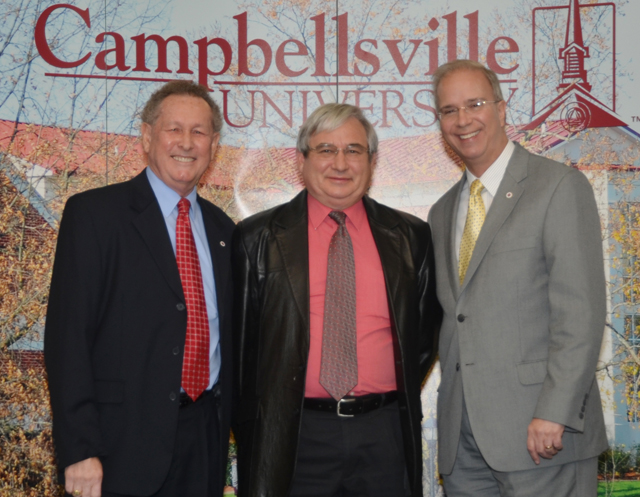 Paul Dameron, center, was recognized for 30 years of service at CU April 26 by Dr. Frank Cheatham, left, senior vice president for academic affairs, and Dr. Michael V. Carter, president. (Campbellsville University Photo by Ye Wei "Vicky")