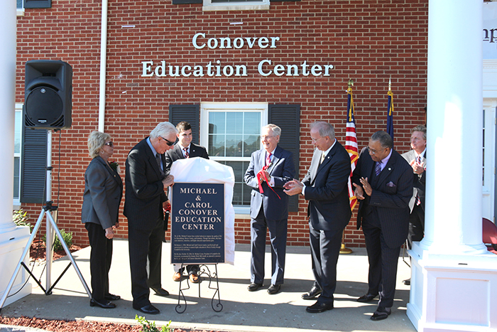 A plaque honoring Michael and Carol Conover was unveiled by from left: Carol Conover, Michael Conover, Wes Carter, CU regional director; U.S. Sen. Mitch McConnell, Senate Majority Leader; Dr. Michael V. Carter, CU president, and Dr. Joseph L. Owens, chair of the CU Board of Trustees. (CU Photo by Drew Tucker)