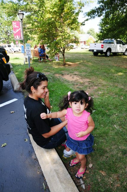 Little Sophia Santos and her mom, Ana, were among those serving new students from Pleasant Hill Baptist Church in Campbellsville. (Campbellsville University Photo by Linda Waggener)