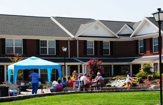 Members of the Pleasant Union Baptist Church helped students move into the Campbellsville University men’s village Saturday. They made food to serve and set up a tent by the fountain for comfort of families helping their students get settled. (Campbellsville University Photo by Linda Waggener)