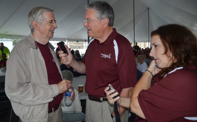  Dr. Keith Spears of WLCU-FM 87.5, right, interviews Randy Herron, chair of the elders at Campbellsville Christian Church, during the church's annual free breakfast during the July 4 event. At right, Jeannie Clark, also of WLCU-FM, was producing the show and giving time cues. WLCU-FM will be covering the parade and car show live July 13 as the July 4 events were postponed due to rain and rescheduled for July 13. Fireworks will be held July 12. (Campbellsville University Photo by Joan C. McKinney)