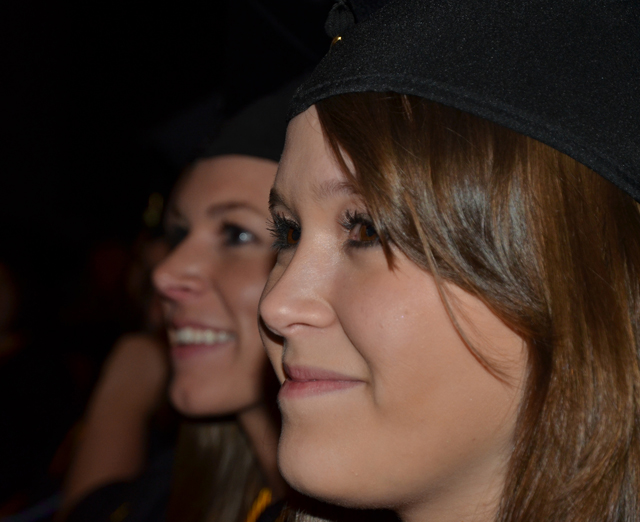 Rebekah Murphy, front of Summersville, Ky., waits to be pinned at the School of Education ceremony.  In back is Casey Mattingly of Loretto, Ky. (Campbellsville University Photo by Joan C. McKinney)