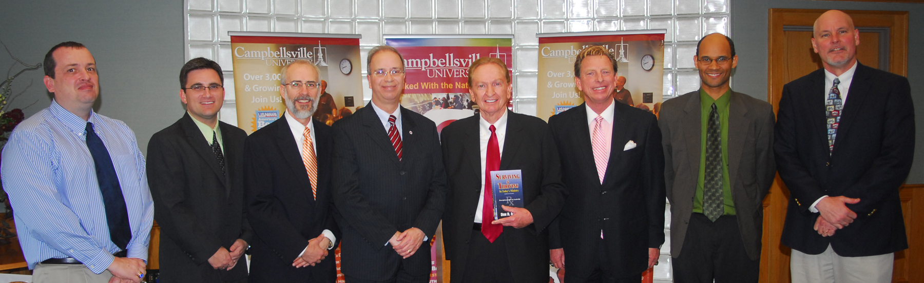 Members of the School of Theology faculty at Campbellsville University met with Dr. Don Mathis, president of the Kentucky Baptist Convention, who donated his books to students in the School of Theology. From left are: Dr. Joe Early; Dr. Shane Garrison; Dr. John Hurtgen, dean of the School of Theology; Dr. Michael V. Carter, president of Campbellsville University; Mathis; Dr. Ted Taylor; Dr. Jarvis Williams; and Dr. Scott Wigginton. (Campbellsville University Photo by Joan C. McKinney)