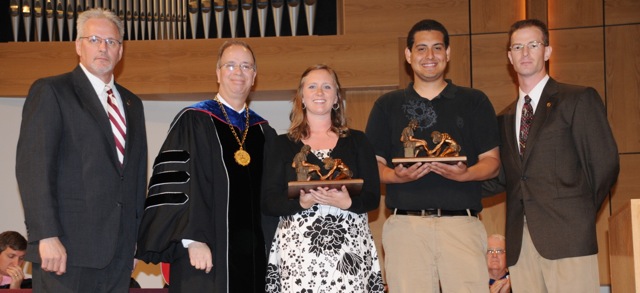 Laura Clark of Bowling Green, Ky., third from left, and Andre' Tomaz of Brazil, receive Servant Leadership Awards at Campbellsville University's Honors and Awards Day. From left are: Dave Walters, vice president for admissions and student services; Dr. Michael V. Carter, president; Clark; Tomaz; and Josh Anderson, dean of students. (Campbellsville University Photo by Ashley Zsedenyi)