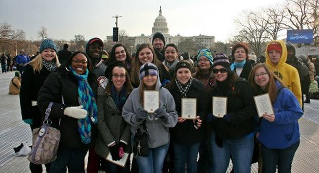 The Sociology Club shows off their “golden tickets” to get into the 2013 inauguration. From left, are: Front row-- Dr. Lindsay Anderson , Kaitlin Weeks, Jordan McMurray, Brandee Lassiter, Candace Thomas and Alysyne Lockhart. Back row-- Ashley Newman, William Pearson, Aly Bryant, Lauren Moore, Matt Hodge, Kacey Bloomfield, Becca Noel, Sandra Cusumano and Shelby Floyd. (Photo submitted)