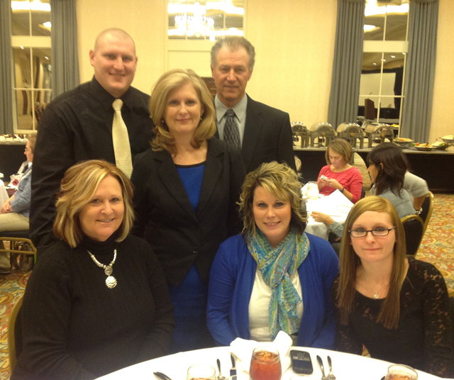 Campbellsville University’s Deborah Spalding celebrates while receiving the Kentucky Special Education Administrator of the Year Award with her family from left: Top row – Jason Spalding, her son; Spalding; and her husband, Ronald. Front row – Sharon Wheatley, sister; and Jessica Wheatley and Megan Allen, both nieces.