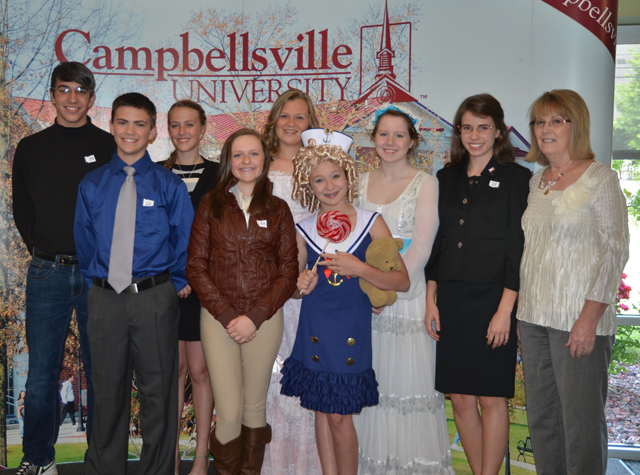 Campbellsville University Middle School Leadership met at Campbellsville University for their annual banquet May 10. Students from Taylor County Middle School Leadership dressed as their favorite person for the banquet. Students from left include: front -- Anthony Hillard (Joe Paterno), Korri Briggs (Amelia Earhart) and Sydney Humphress (Shirley Temple Black). Back row -- Justice Gregory (Steve Jobs), Allison Brockman (Martha Layne Collins), Reagan Pollock (Loretta Lynn), Jilly Bruns (Jane Austen), Payton Howard (Sarah Palin) and Patricia Jones, social studies teacher who is adviser for the group. Campbellsville University’s College of Arts and Sciences works with the schools and their leadership program. (Campbellsville University Photo by Joan C. McKinney)