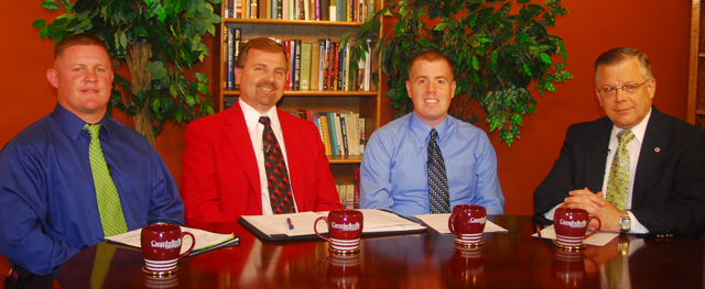 From left, Charles Higdon Jr., principal of Taylor County High School; Tony Jewell, vice principal of Taylor County Middle School; and Brian Clifford, principal of Taylor County Elementary School are interviewed by John Chowning, vice president for church and external relations and executive assistant to the president at Campbellsville University. (Campbellsville University Photo by Joan C. McKinney)
