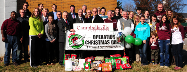  Leaders from the Campbellsville-Taylor County community and Campbellsville University gathered at the Taylor County Relay Center to celebrate Operation Christmas Child efforts. Taylor County raised 5,238 shoeboxes to be delivered around the world. Campbellsville University raised 1,116 of the total number of shoeboxes. (Campbellsville University Photo by Ellie McKinley)