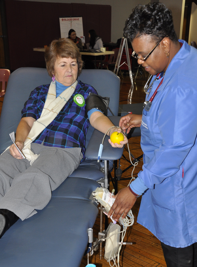 Campbellsville University's Teresa Spurling, associate professor of education, gives her first blood donation at Campbellsville University Jan. 21.  (Campbellsville University Photo by Bayarmagnai "Max" Nergui)