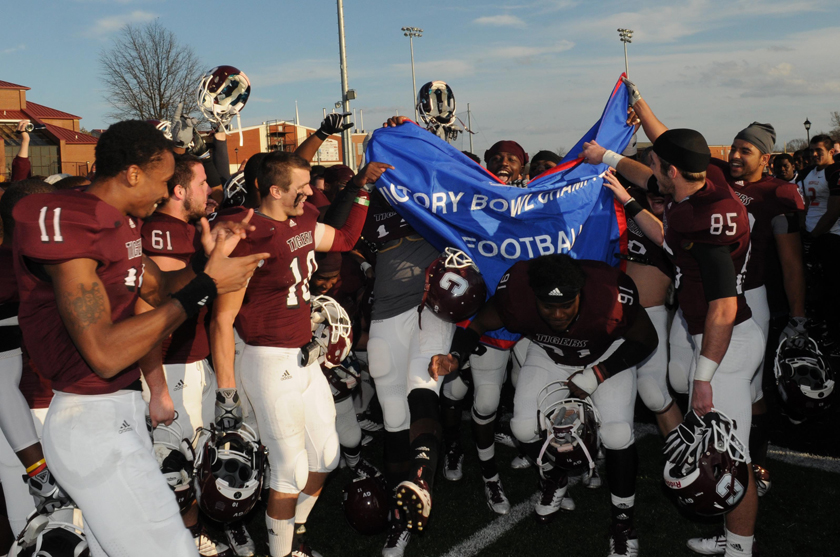 Campbellsville University players celebrate their win in the National Christian College Athletic Association (NCCAA) Victory Bowl Saturday against Greenville College, 21-7. It is CU's first football title of any kind since winning a Mid-South Conference title in 1997. (Photo courtesy of Richard RoBards / Campbellsville University)