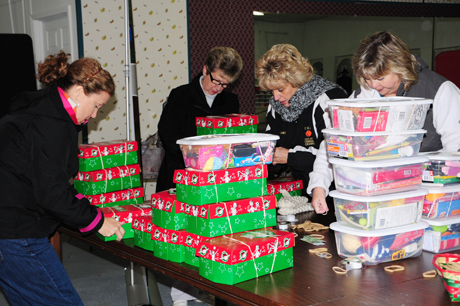 Among the volunteers helping with Operation Christmas Child were  from left: Jessica Eastridge, Anna Keltner, Beverly Janes and Linda  Ward.  (Campbellsville University Photo by Kyle Perkins)