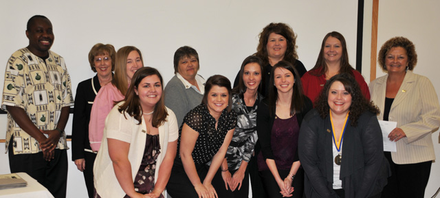Bachelor of Social Work graduates were recognized in the annual Carver School of Social Work and Counseling on Dec. 16. From left are: front row— Amanda Kanode of Campbellsville, Ky.; Jessica Adkins of Hodgenville, Ky.; Candace Dye of Campbellsville, Ky.; Bethany Gray of Campbellsville, Ky.; and Amber Rich of Columbia, Ky. Back row—Dr. Japheth Jaoko, associate professor of social work; Dr. Helen Mudd, associate professor of social work; Kasi Morrow of Bronston, Ky.; Alicia Burton of Nancy, Ky.; Cindy Dishman of Monticello, Ky.; Laurie Bryant of Liberty, Ky.; and Mary Lou Stephens, assistant professor of social work. (Campbellsville University Photo by Linda Waggener)