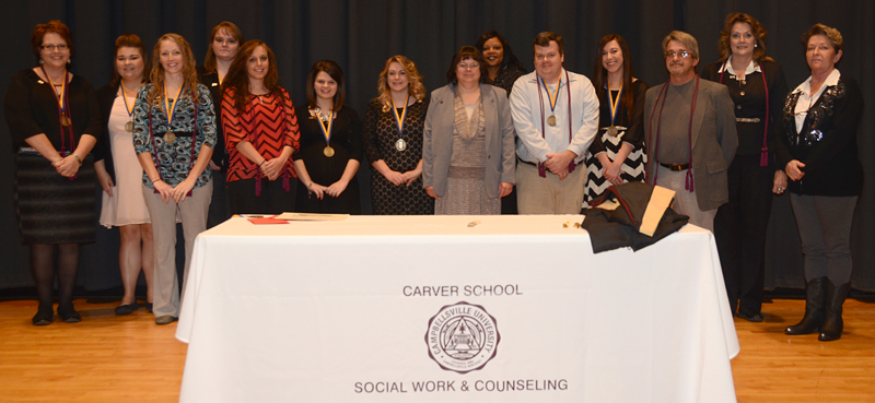 Bachelor of social work degree recipients were: From left - Paige Jones, Christian Nally, Kelsey Isaacs, Melissa Landram, Chelsea Humble, Jessica Paris, Debbie Huff, Lisa Matney, Margo Carey, Brian Huber, Courtney Mills, Anthony Evans, Tammy Bowlin and Linda Rex. (Campbellsville University Photo by Drew Tucker)