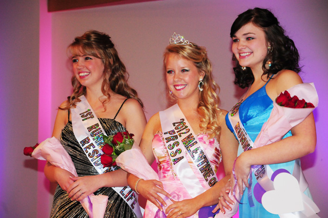 Audrey Wunderlich, center, a sophomore of Frankfort, Ky., was crowned the 70th CU Valentine Queen in the annual pageant, Feb. 10. Holly Davidson, left, a senior from Danville, Ky., was named first runner-up, and Andrea Nolley, right, a junior from Elkhorn, Ky., was named second runner-up. (Campbellsville University Photo by Ashley Wilson)