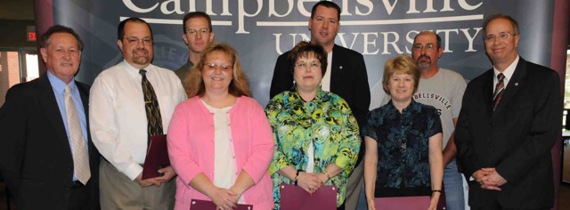 Those Campbellsville University employees who were honored for 10 years of service were from left: Front row - Christy Spurling, Sheila Douglas, Debbie Carter and Dr. Michael V. Carter. Back row - Dr. Frank Cheatham, vice president for academic affairs who presented the awards; Dr. Dwayne Howell; Josh Anderson, Benji Kelly and Jack Beard. (Campbellsville University Photo by Ashley Zsedenyi)