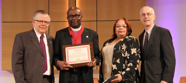 Bishop Charles J. King Jr., second from left, receives the Campbellsville University Leadership Award from Dr. John Chowning, vice president for church and external relations and executive assistant to the president, at chapel. The Rev. Pamela Buford, co-pastor of Fannie Chapel CME Church, and Dr. John Hurtgen, dean of the School of Theology at Campbellsville University,  also participated. (Campbellsville University Photo by Rachel DeCoursey)