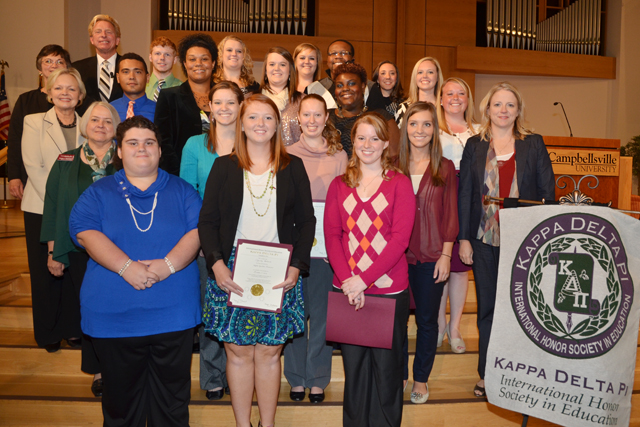 Kappa Delta Pi new initiates and officers for the Alpha Epsilon Omicron Chapter include from left: First row – Kristi Stillwell, Chasity Ballard and Megan Hermann. Second row – Nancy Newberry, Danielle Bastin, Jessica Egbert, Kelly Hill and Dr. Donna Hedgepath. Third row – Dr. Beverly Ennis, Jamaal Stiles, Bianca Graves-Lockhart, Paige Thompson, Marissa Brooks, Devin Reynolds and Alena Maggard. Fourth row – Dr. Carolyn Garrison, Dr. Ted Taylor, Brent Hatfield, Megan Parson, Courtney Gupton, DeMarcus Compton and Kaylynn Best. (Campbellsville University Photo by Joan C. McKinney)