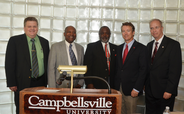 Leaders of the Taylor County Ministerial Association pose with United States Sen. Rand Paul (R-Ky.), fourth from left, and Dr. Michael V. Carter, president of Campbellsville University, far right. From left are: the Rev. Michael Goodwin, vice president of the TCMA; the Rev. Michael Caldwell, president; and the Rev. James Washington, secretary. (Campbellsville University Photo by Joan C. McKinney) 