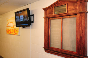A commemorative marker in the hallway  recognizes donors of the renovation project. The TV will display student salvation  testimonies. (Campbellsville University  Photo by Christina Kern)