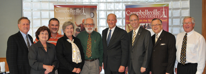 Dr. Robert King, front row, fourth from left, president of the Kentucky Council on Postsecondary Education, visited  Campbellsville University today discussing issues in higher education. From left are: Front row -- Campbellsville Mayor Brenda Allen; Ginny Flanagan, executive director of the Kentucky Agriculture Heritage Center, Harrodsburg; Dan Flanagan, board member of CPE; King; Dr. Michael V. Carter, president of Campbellsville University; John Chowning, vice president for church and external relations and executive assistant to the president at CU; and Taylor County  Judge/Executive Eddie Rogers. Back row -- Dr. Frank Cheatham, vice president for academic affairs; and Bam Carney, Kentucky state representative. (Campbellsville University Photo by Joan C. McKinney)