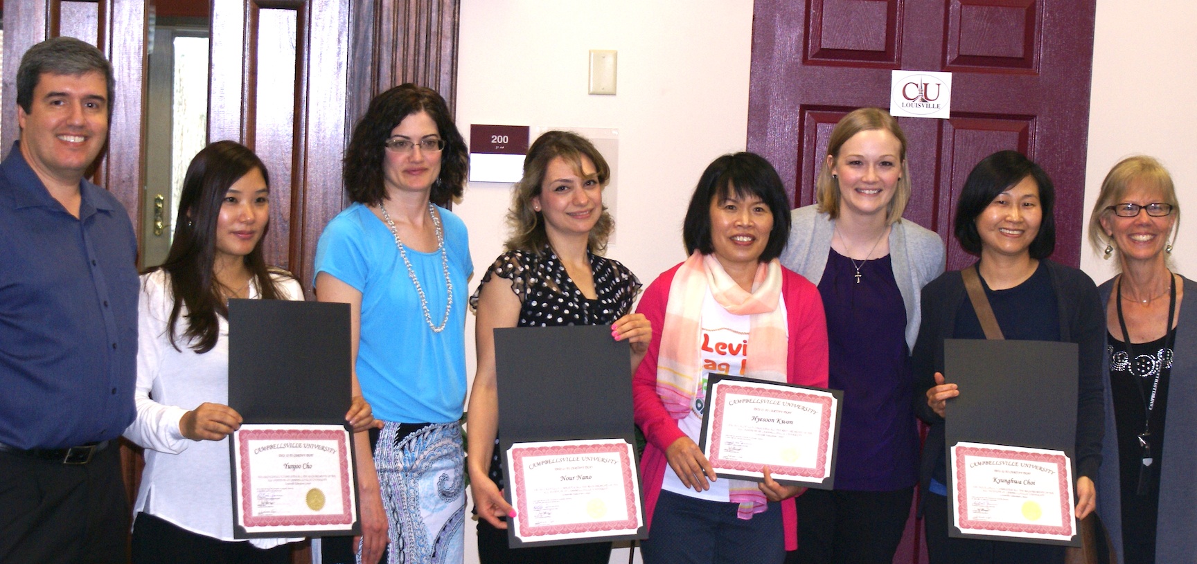 English as a Second Language (ESL) students at Campbellsville University's Louisville Education Center received their certificates of completion April 30. From left are: instructor Eduardo Trindade, Yunjoo Cho, assistant director of ESL, Ardeen Top, student Nour Nano, student Hyesoon Kwon, CU alumna and former adjunct ESL teacher Ashley Boyd, Kyunghwa Choi and instructor Joy Hagan. For more information about the ESL program in Louisville, call (502) 753-0264. (Campbellsville University photo provided by the Louisville Education Center)