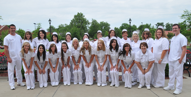Campbellsville University School of Nursing graduates recognized at a pinning ceremony, May 3 are: front row, from left-- Hannah White of Hodgenville, Ky.; Kayla Raganas of Campbellsville, Ky.; Chelsea Jeffries of Greensburg, Ky.; Erica Nunn of Campbellsville, Ky.; Shannon Cahill of Columbia, Ky.; Brittany Price of Liberty, Ky.; Rebecca Owens of Elizabethtown, Ky.; Barbara Sanders of Campbellsville, Ky.; Lynette Costello of Morgantown, Ky.; and Tammy Guffey of Russell Springs, Ky. Back row-- Nathan Clark of Somerset, Ky.; Courtney Keller of Angola, Ind.; Maria Farris of Columbia, Ky.; Angie Cash of Louisville, Ky.; Kristi Young of Summersville, Ky.; Leshia Fair of Glasgow, Ky.; Latonya Bertram of Campbellsville, Ky.; Laura Williams of Campbellsville, Ky.; Sandy Stearns of Columbia, Ky.; Holly George of Russell Springs, Ky.; Tiffany Montgomery of Lebanon, Ky.; Keithena Holman of Edmonton, Ky.; and Jordan Thompson of Campbellsville, Ky. (Campbellsville University Photo by Christina L. Kern)