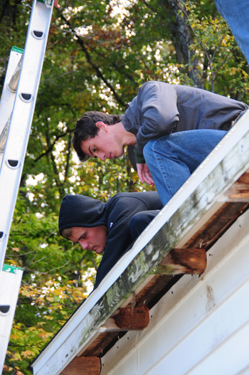  Campbellsville University students work on roofing  with Kentucky Heartland Outreach. (Campbellsville University Photo by Kasey Ricketts)