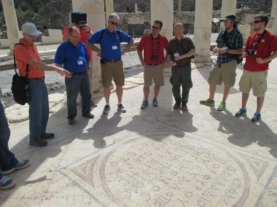 Dr. John Hurtgen interprets the Greek  writing found on the floor of this very old  temple. From left: Hurtgen, David Wray, Rev.  Ed Pavy, Rev. Brad Lauer, Tommy Ramey,  Aron Neal and Joey Bomia.