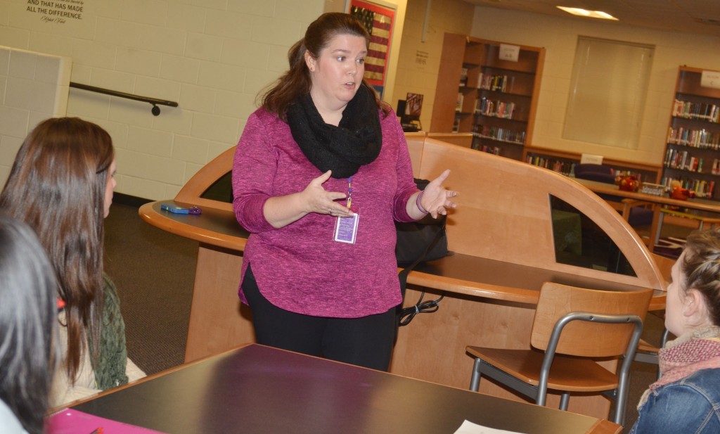 CMS Guidance Counselor Beth Wiedewitsch talks to CU education students