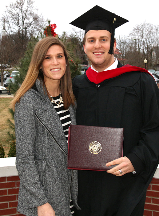While working for Campbellsville University as assistant director of Church Outreach, Joey Bomia also graduated with a Master of Theology degree. From left: Erin and Joey Bomia. (Campbellsville University Photo by Drew Tucker)