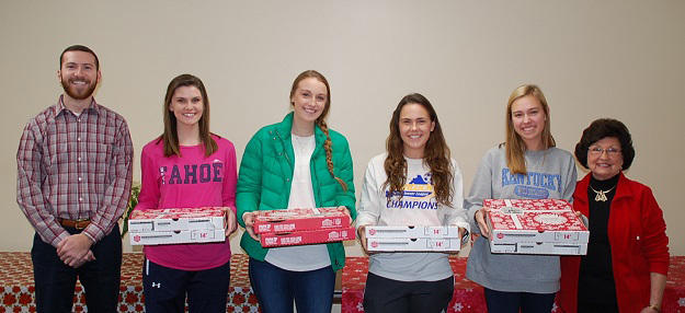 Four Campbellsville University freshmen students donate left-over meal Flex Dollars to feed those less fortunate. From left are: Marcus Rodgers, the academic coach; Madison Malone of Louisville, Ky., Katy Carmichael of Lawrenceburg, Ky., Bailey Nall of Elizabethtown, Ky. and Sara Basham of Louisville with Brenda Allen, chairwoman of the Green River Ministries Board.
