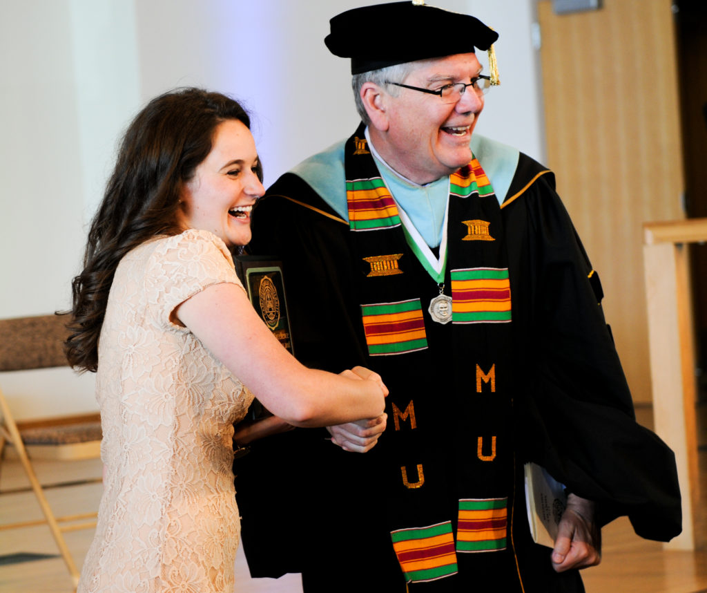 Abby Harnack of Bowling Green, Ky., takes a photo with Dr. Keith Spears, vice president for communications and assistant to the president, after the Honors and Awards Day at Campbellsville University. (Campbellsville University Photo by Joshua Williams)