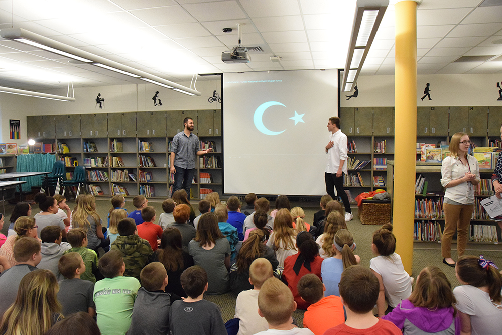 Campbellsville University students speaking to students at Green County Intermediate School include from left: Muslum Can “John” Kaya of Turkey, Miguel Angel Galindo Imboden of Spain and Keliah Coverstone of Burkesville, Ky. (Campbellsville University Photo by Shelby Hall)