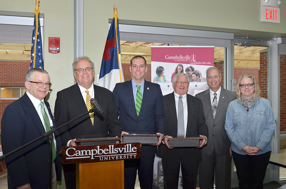 From left Dr. John Chowning, pastor of Saloma Baptist Church who serves as executive assistant for government, community and constituent relations to president of Campbellsville University, Michael V. Carter, president, and Dr. Donna Hedgepath, vice president for Academic Affairs, present public service awards to  Max Wise, Kentucky State senator; and Eddie Rogers, Taylor County judge/executive and to John “Bam” Carney, state representative for Adair and Taylor counties, who was in Washington, D.C (Campbellsville University Photo by Joan McKinney)     