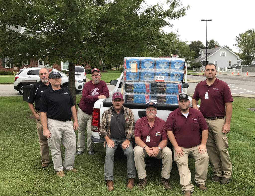 Physical Plant employees, many of whom are not pictured, collected money and partnered with Lowe’s to provide a pallet of water to the Hurricane victims. The employees were inspired by the CU Fishing Team and wanted contribute toward the hurricane relief. From left are: Lynn Henderson, Alvin Humphress, Lloyd Wilds and Christian Cowherd. Back row – Robert Stotts, Stephen Morris and JP Judd.