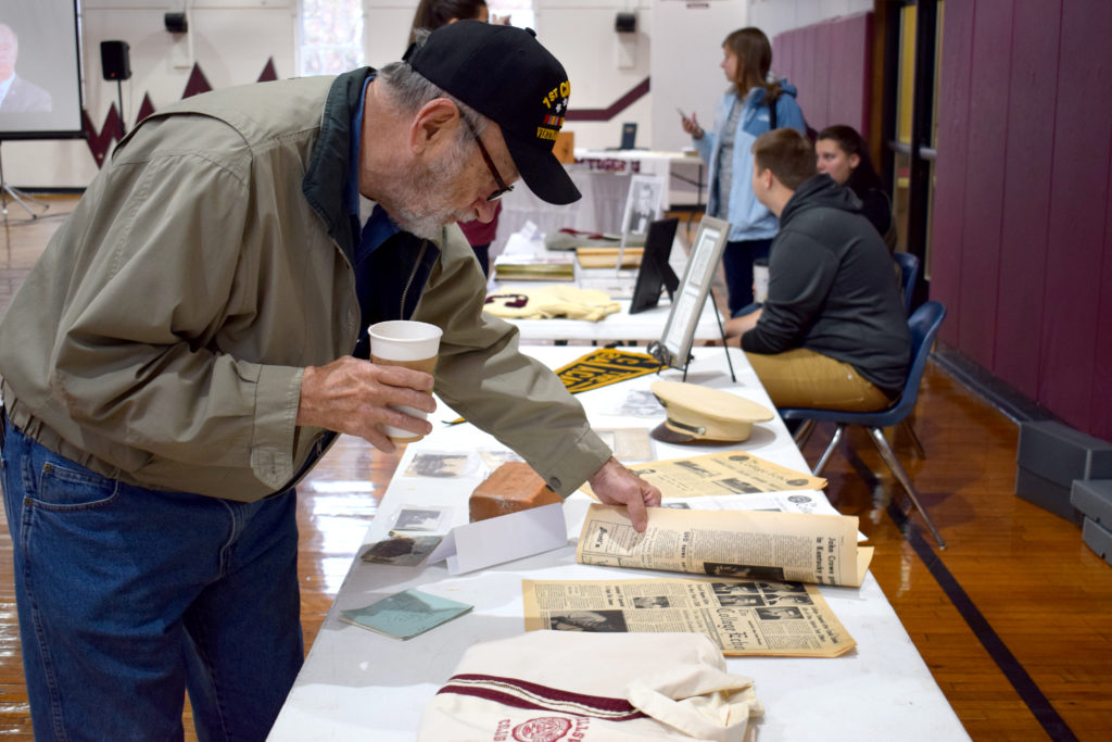 Everett Greer checks out different items from different time periods at the history of Campbellsville University and the City of Campbellsville Exhibition during 2017 Homecoming at Campbellsville University. (Campbellsville University Photo by Kyrsten Hill)