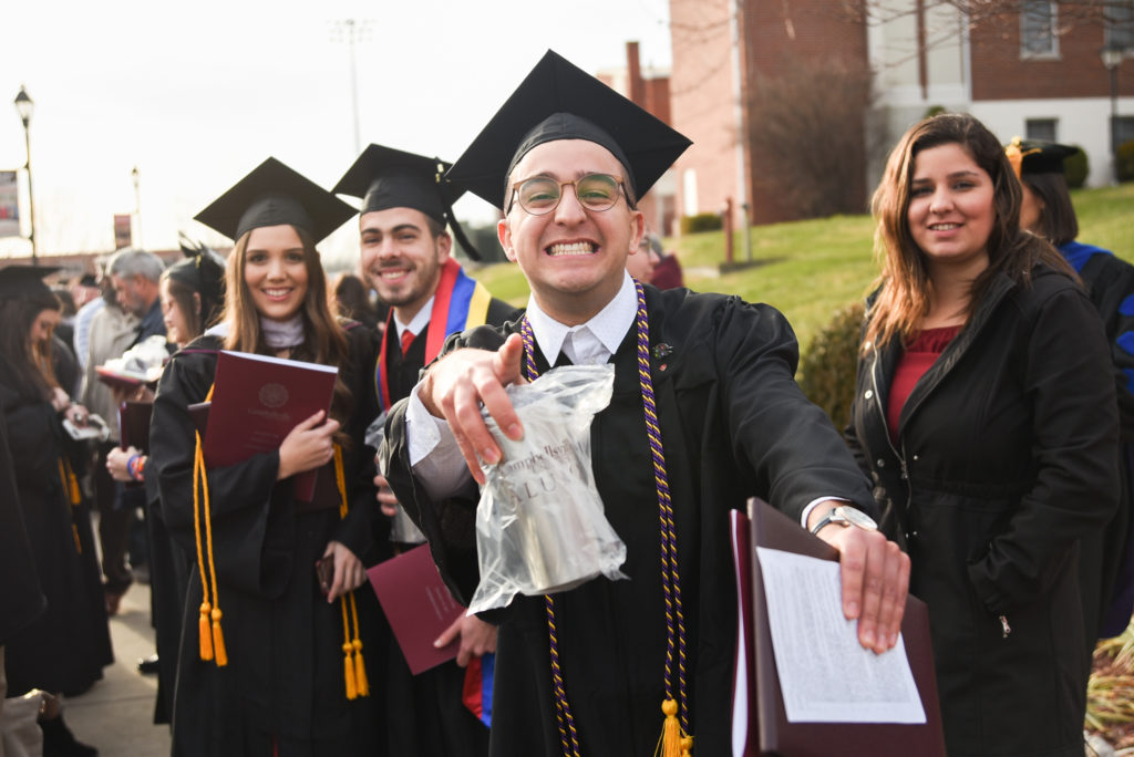 Diego Cardenas of Venezuela expresses his happiness after his graduation ceremony at Campbellsville University. (Campbellsville University Photo by Joshua Williams)